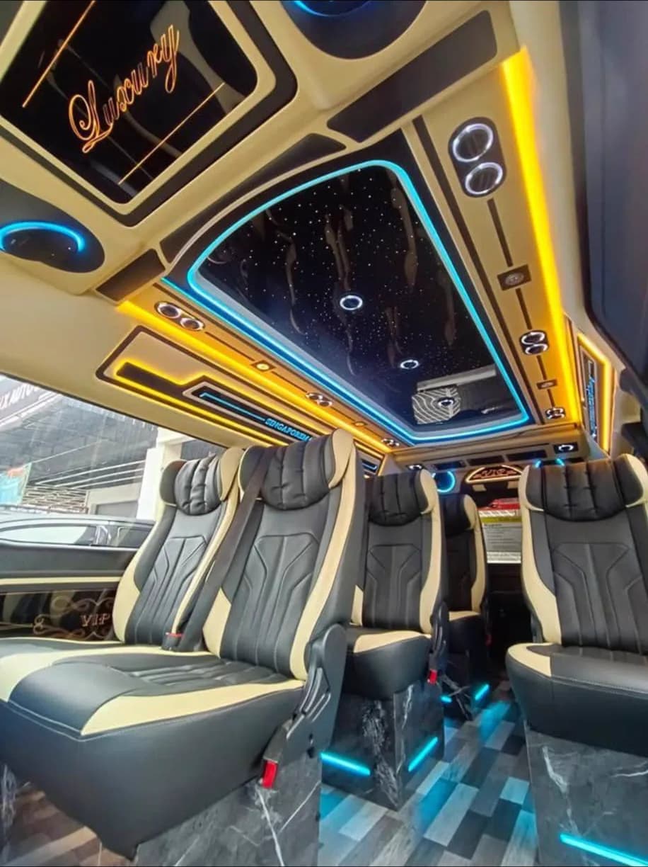 VIP 9/13-seater minibus cabin — starlight headliner, LED accent lighting, and individual VIP recliners