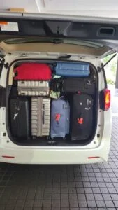Image 29: group transfer with heavy luggage,